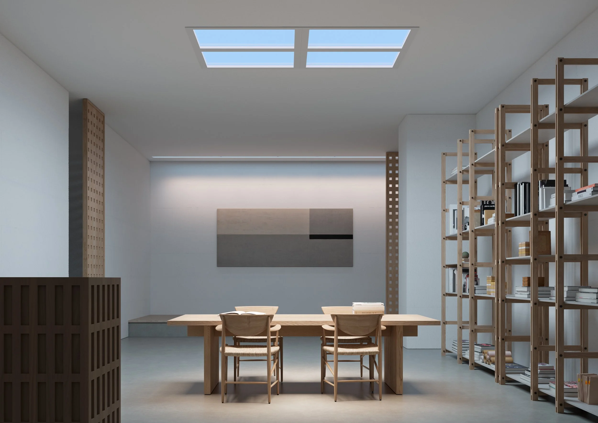 Modern interior with wooden furniture and shelving, natural light from skylights, and a minimalist design.