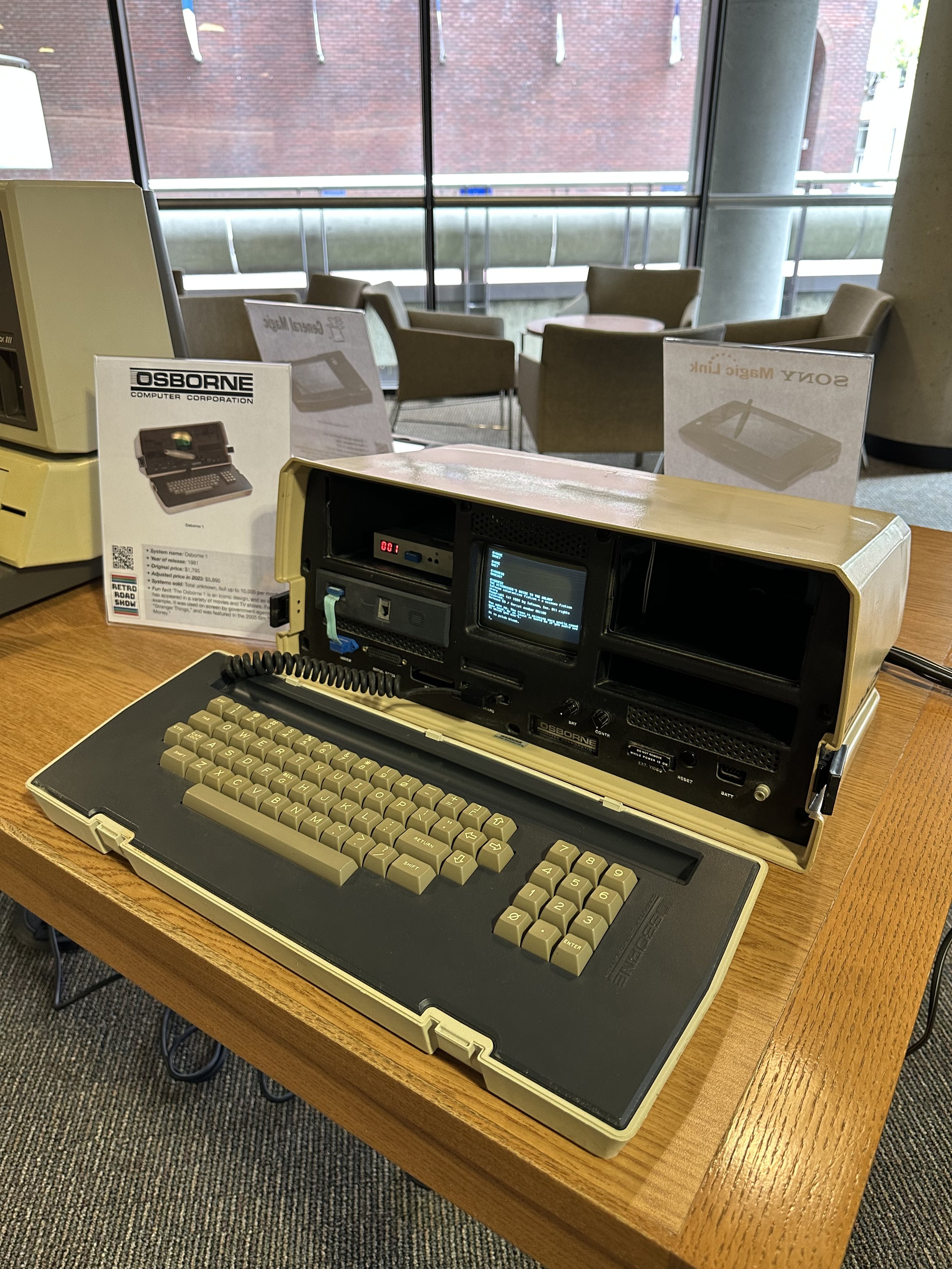 The Osborne 1 is the first commercially successful portable microcomputer, released in 1981 by Osborne Computer Corporation. Weighing in at a substantial 25lbs, this "luggable" computer sports dual low-density 5.25" floppy drives flanking an astonish