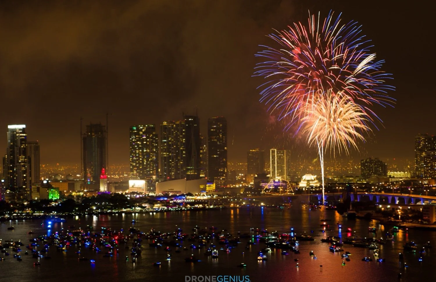 Fireworks above the Miami waterfront at night, photographed by Drone Genius.