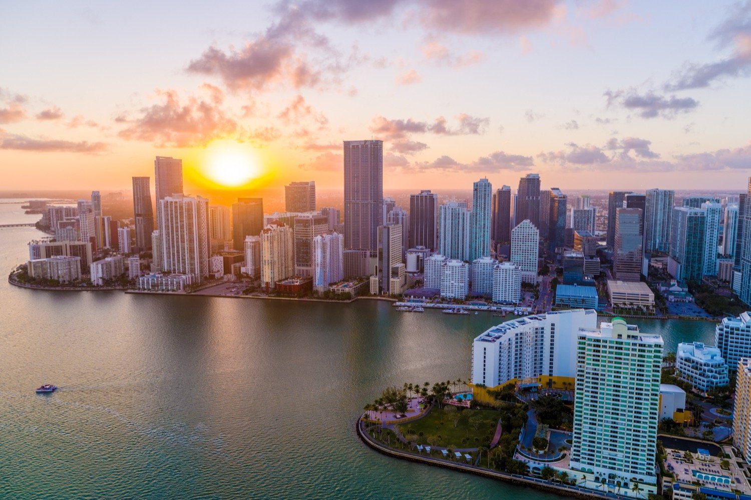 Miami waterfront and Brickell skyline at sunset, photographed by Drone Genius.