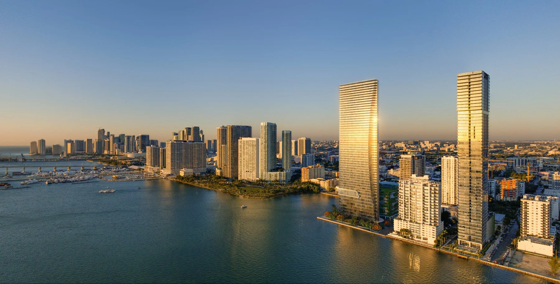 EDITION Residences Miami Edgewater architectural rendering of the waterfront skyline at sunset