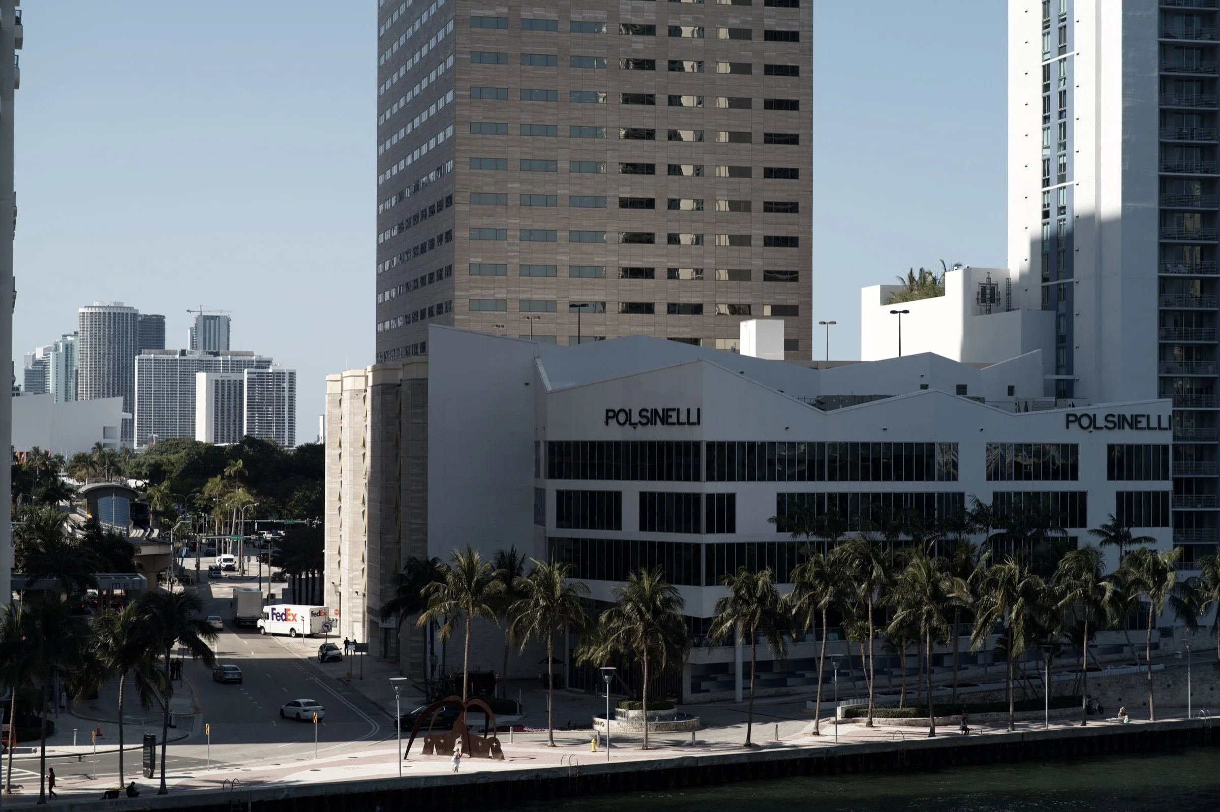 Aerial view of the Polsinelli building beside the Miami River, photographed by Drone Genius.