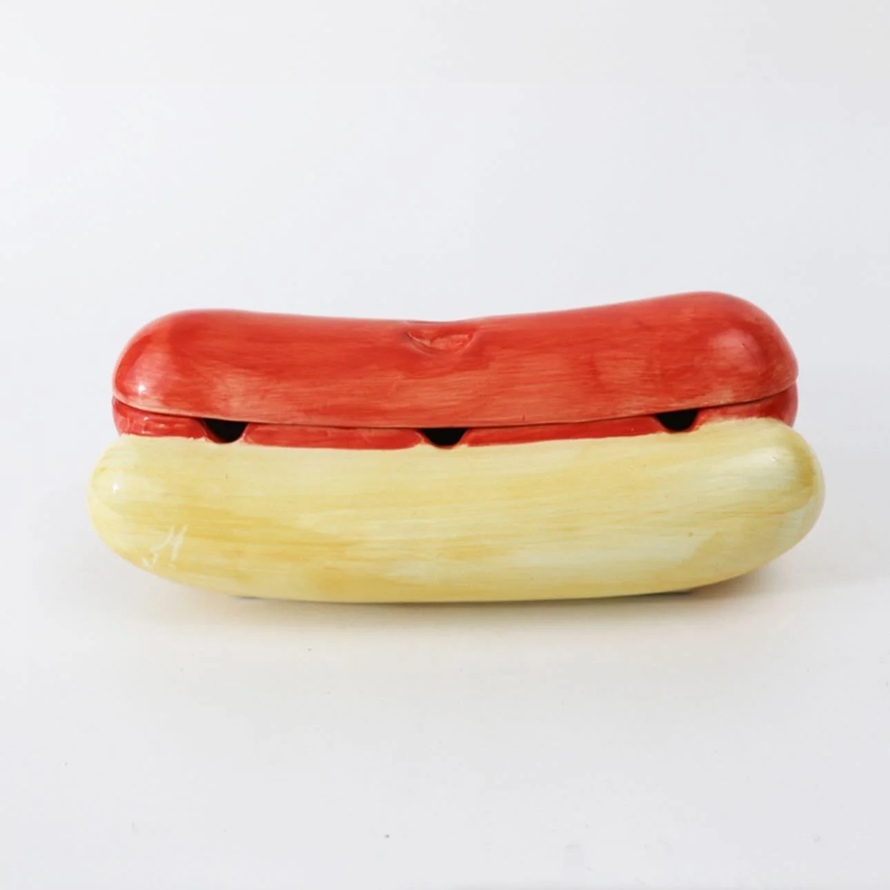 A ceramic hotdog for your favorite hot dog loving friend 🌭- this and more unique gifts online