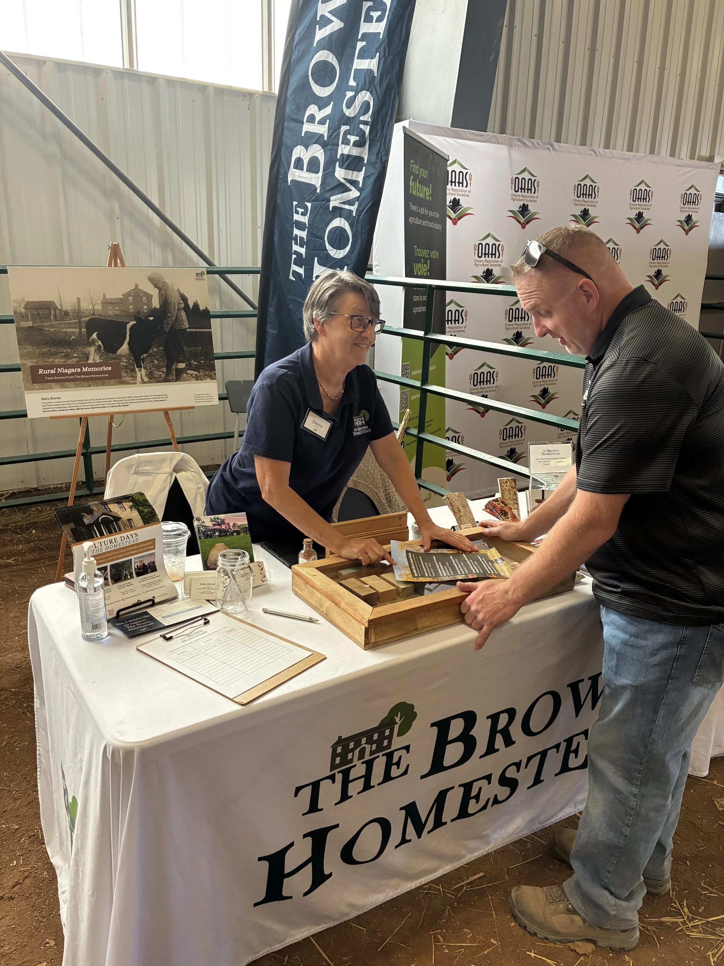 IPM 2025 outreach volunteer visitor connect table.jpeg