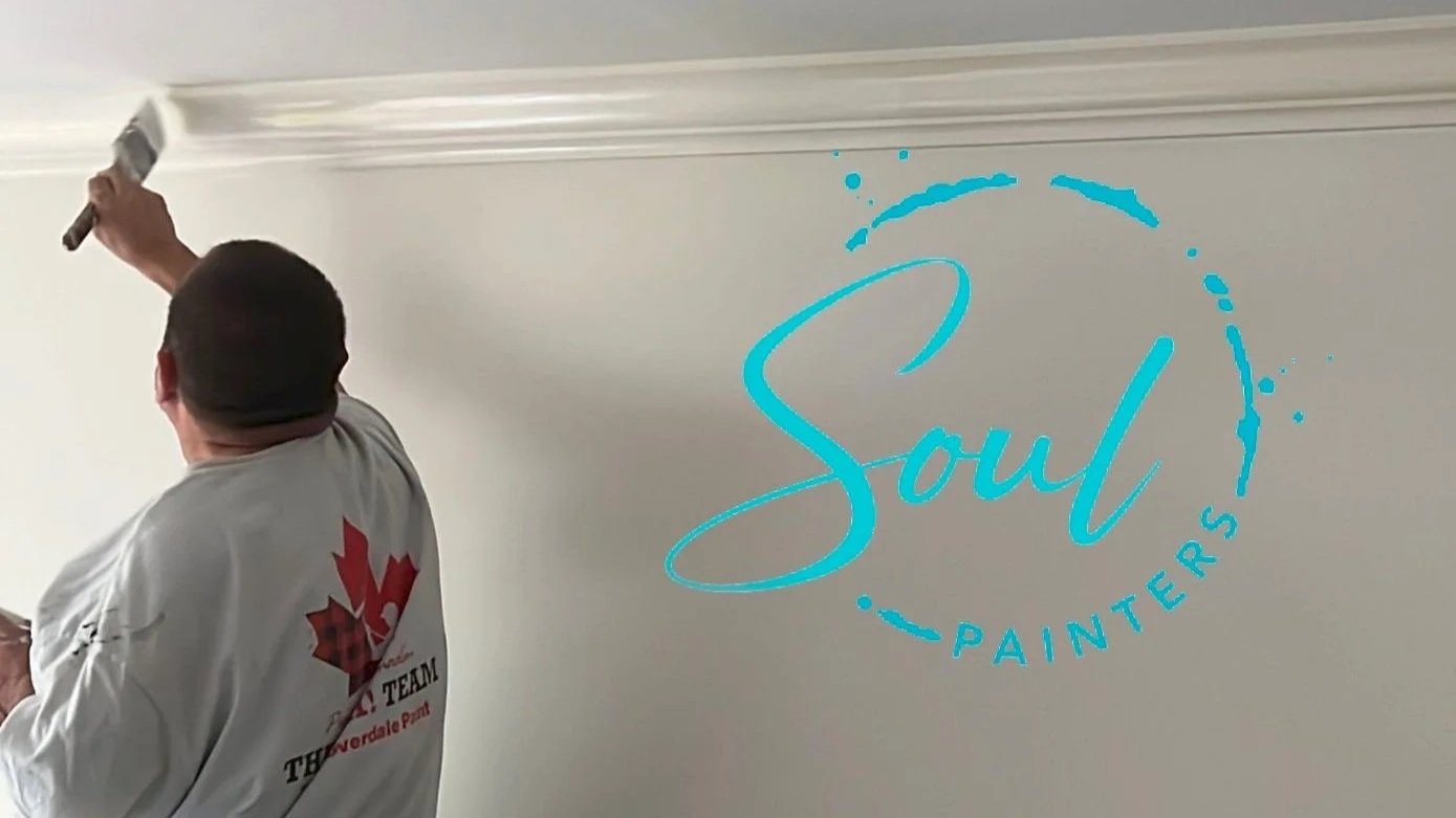 Painter rolling fresh paint on walls for a quick rental turnover