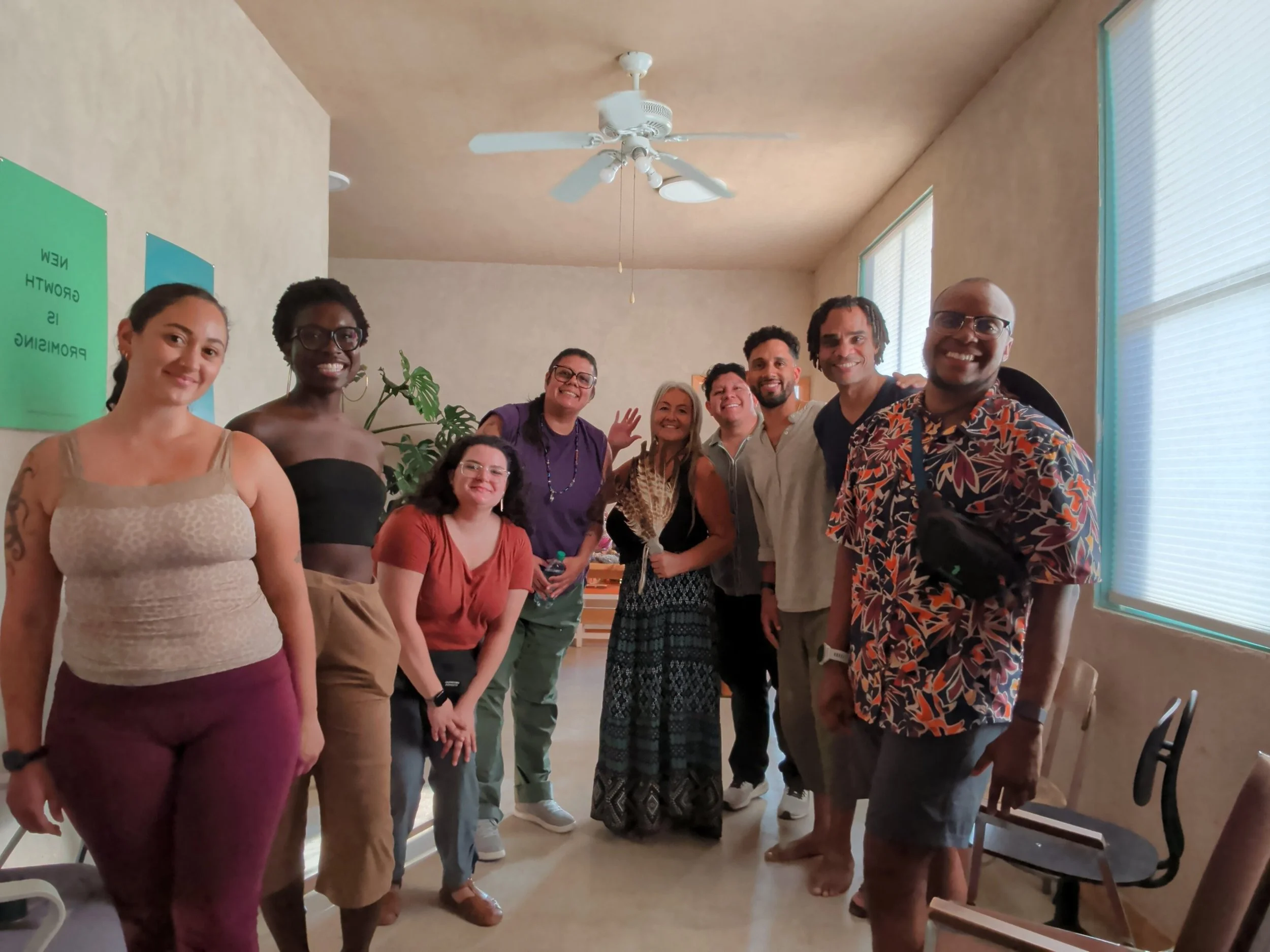 Kindred clinicians, fellows and a guest teacher together indoors at the 2026 Kindred retreat in the Cuyama Valley