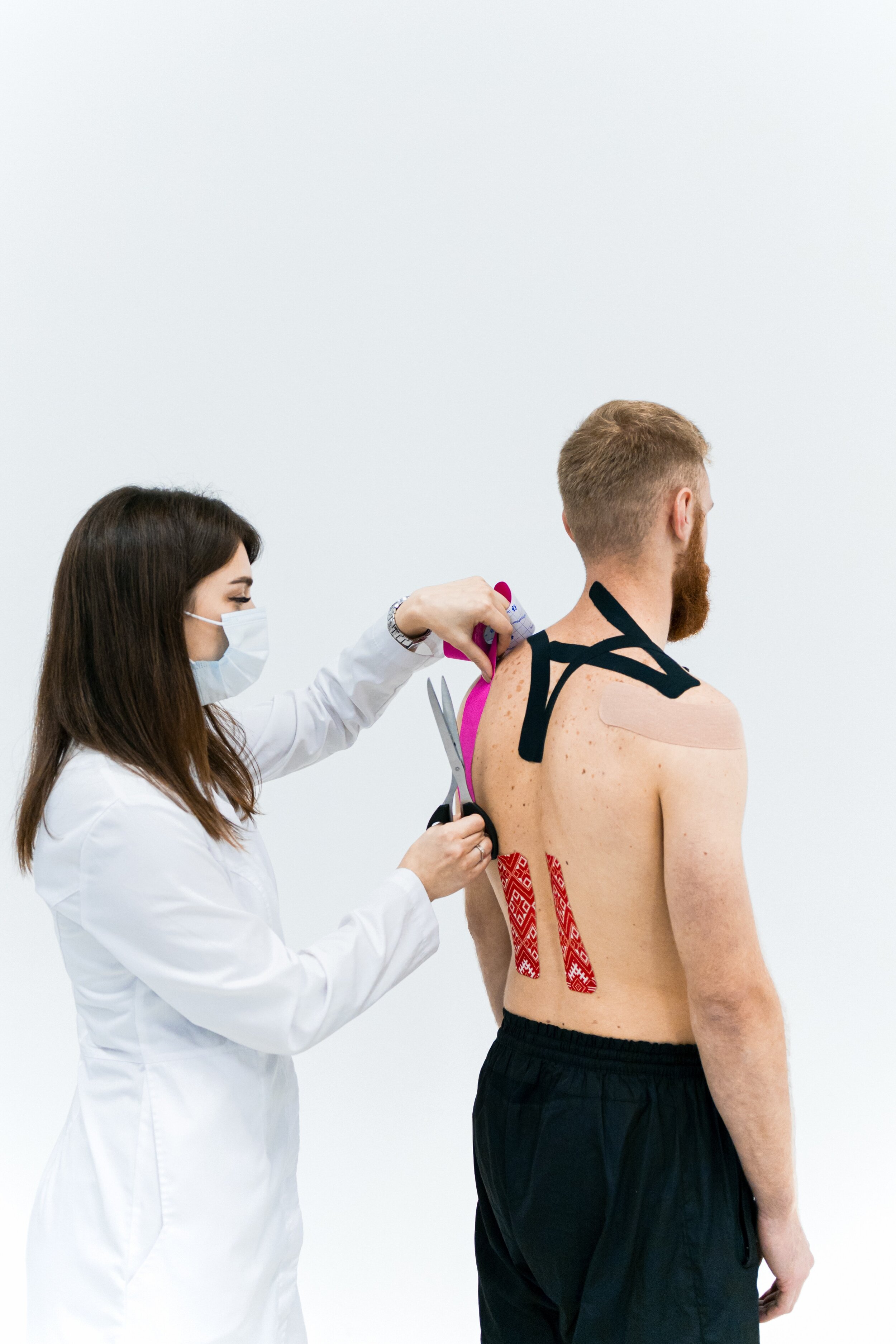 Kinesiology Taping: Unraveling the Mystery Behind the Colorful Tape –  Ortman Chiropractic