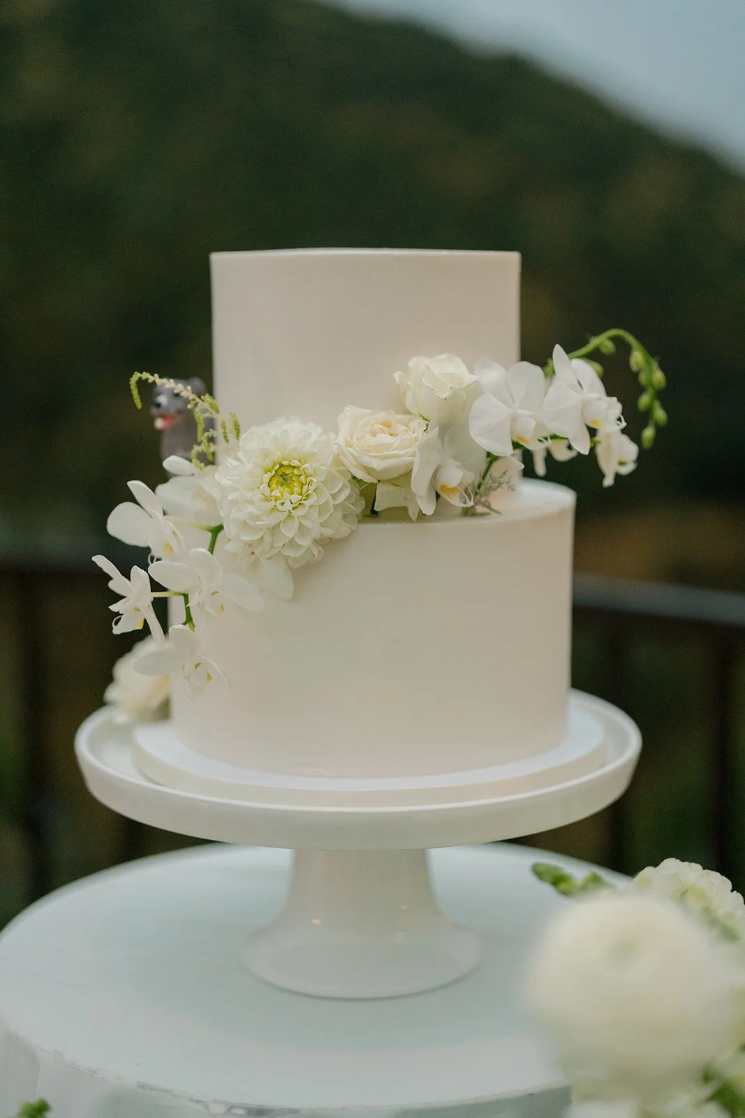 Buttercream cake with fresh floral by Citrus Blossom Bakery