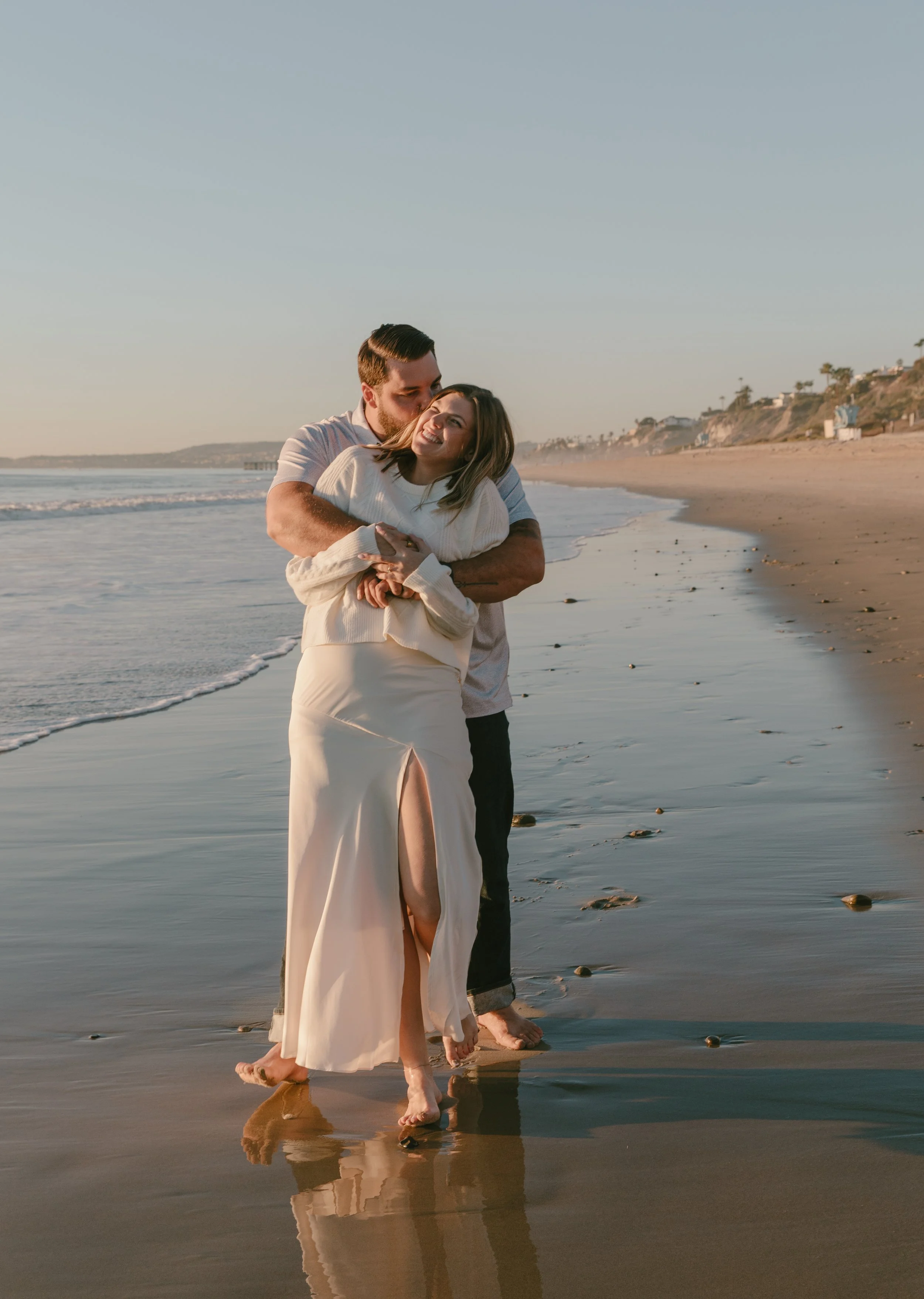 engagement photos on the beach in orange county california.jpg