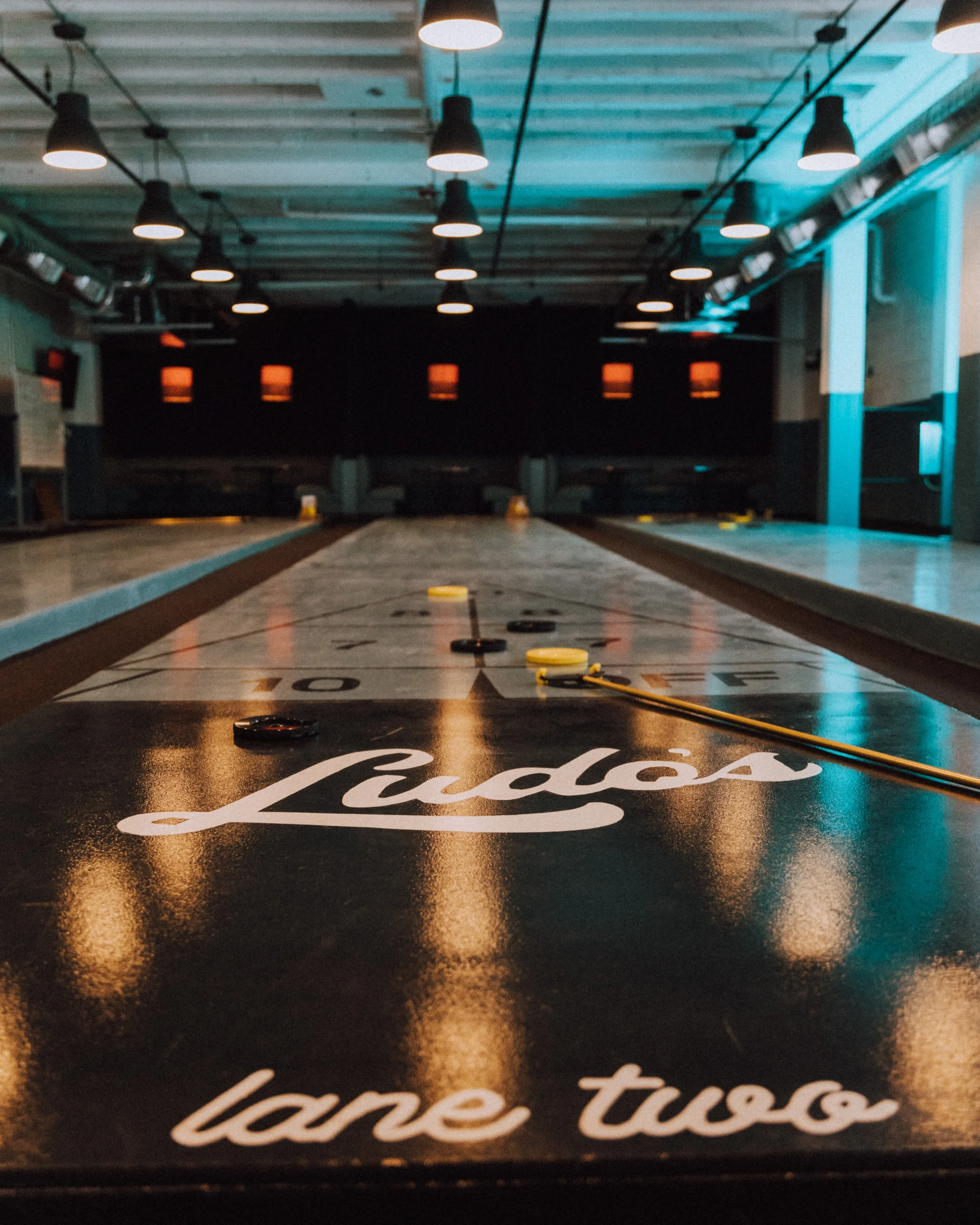 Visit — Ludo's Shuffleboard Bar