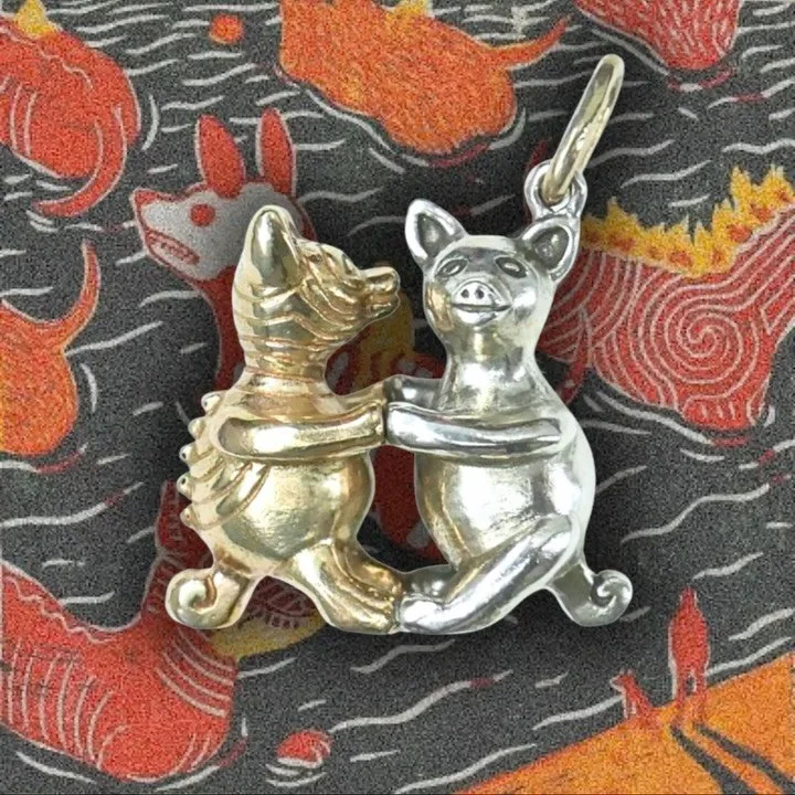 Passing ancestral knowledge from elder to youth these &lsquo;dancing&rsquo; Colima dogs are an ancient depiction of protection and generational growth. These sculptures were found in Mexico as early as 300 BCE and continue to be a symbol of the cultu