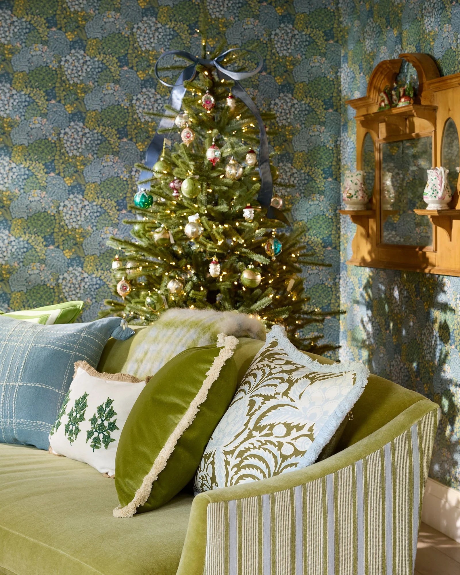 Living-Room-Multi-Pattern-Green-Velvet-Striped-Sofa-Hinsdale-Wisley-Floral-Wallpaper-brand-x14426_CV1.jpg
