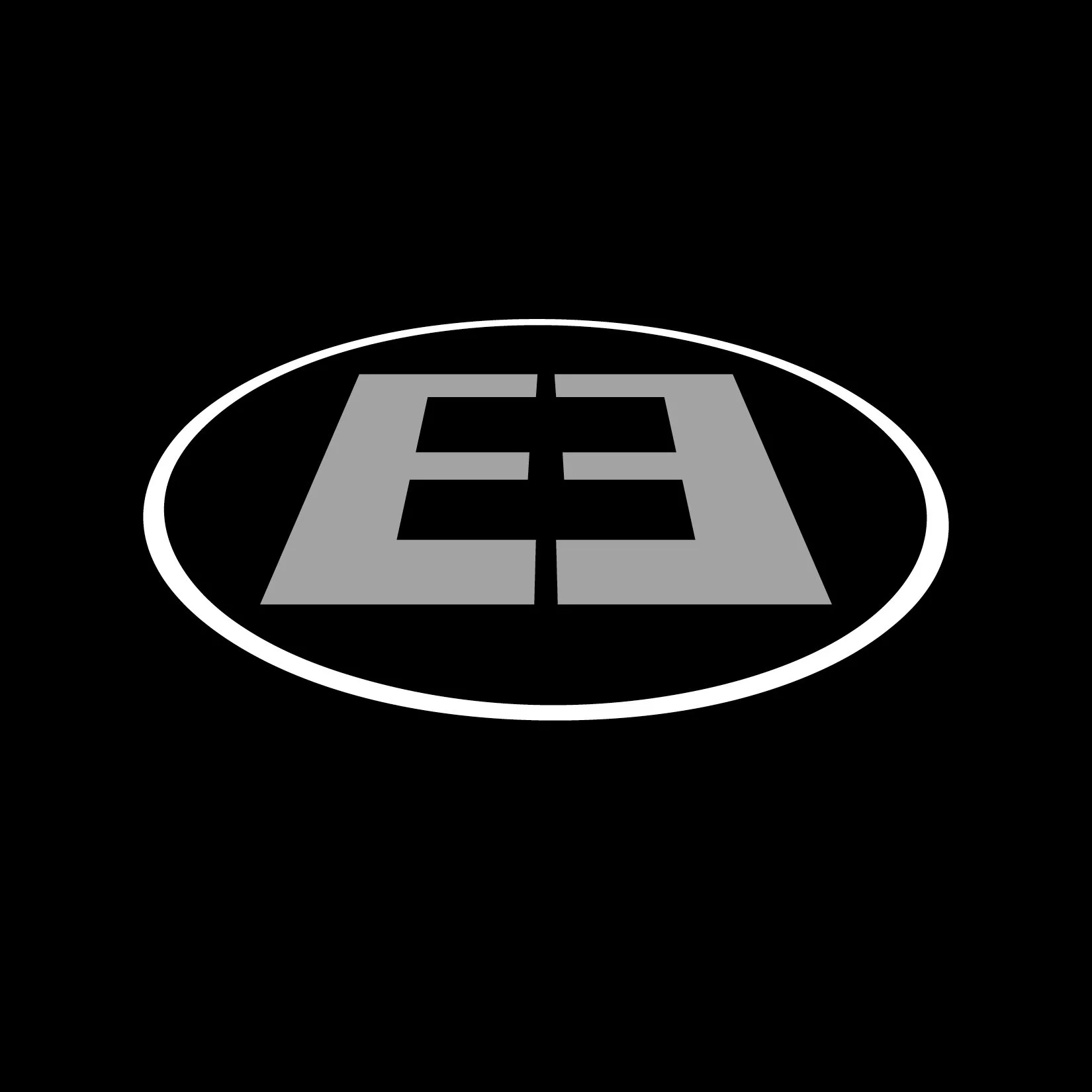 Black background with a gray logo resembling the letter 'E' and the letter 'A' joined, enclosed in a white oval outline.