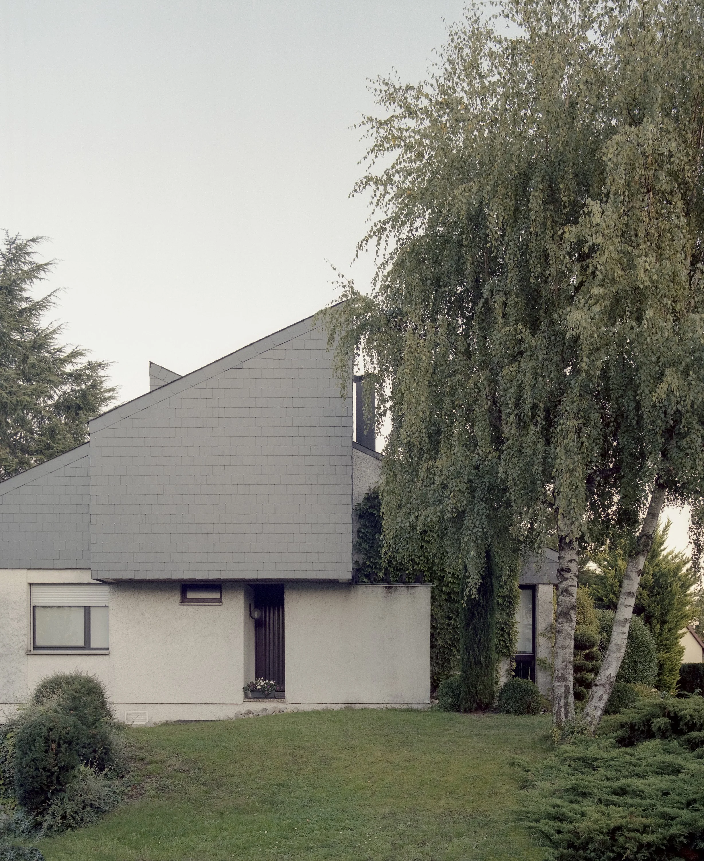 Rénovation d'une maison de style post-moderniste