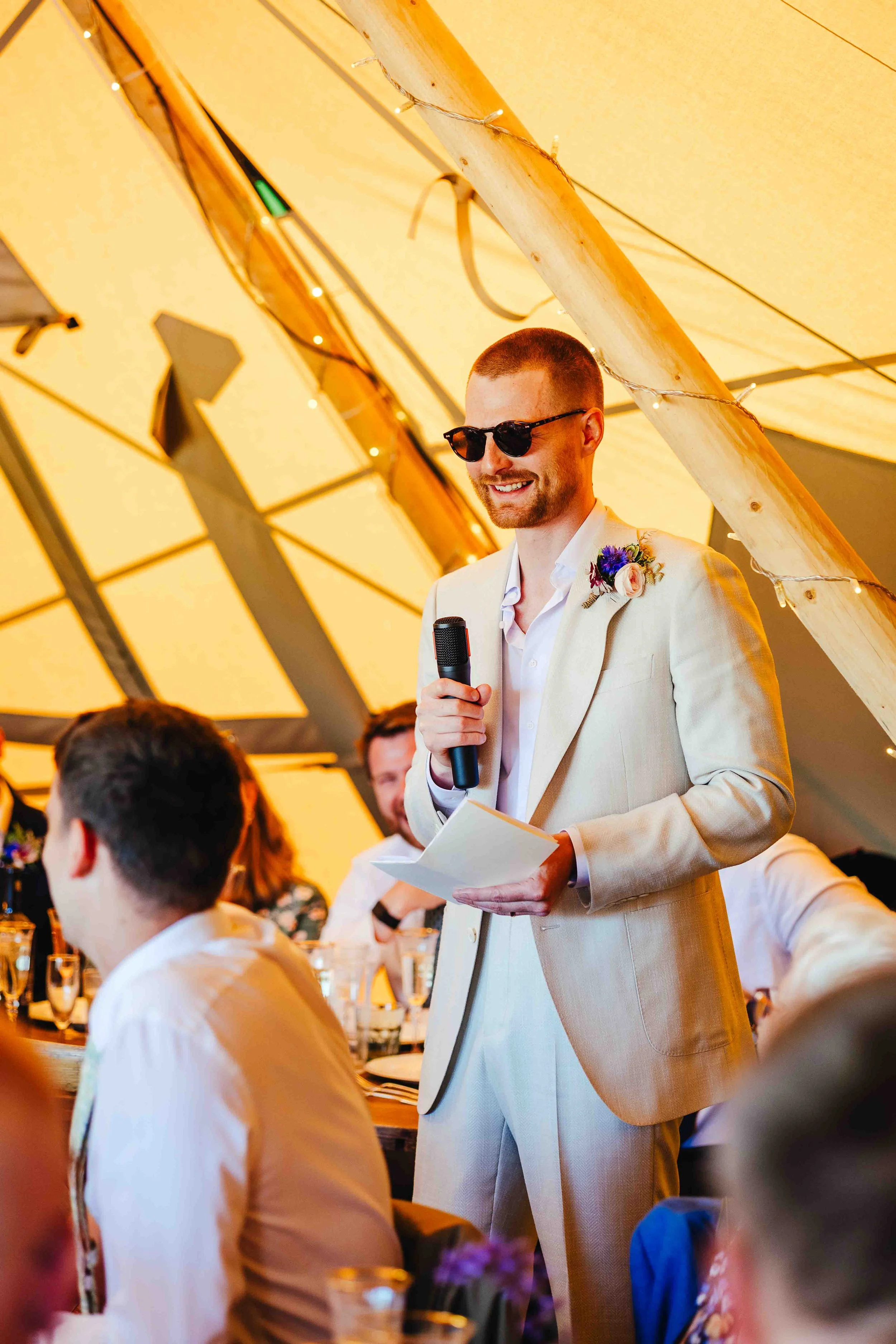Groom speech with sunglasses on
