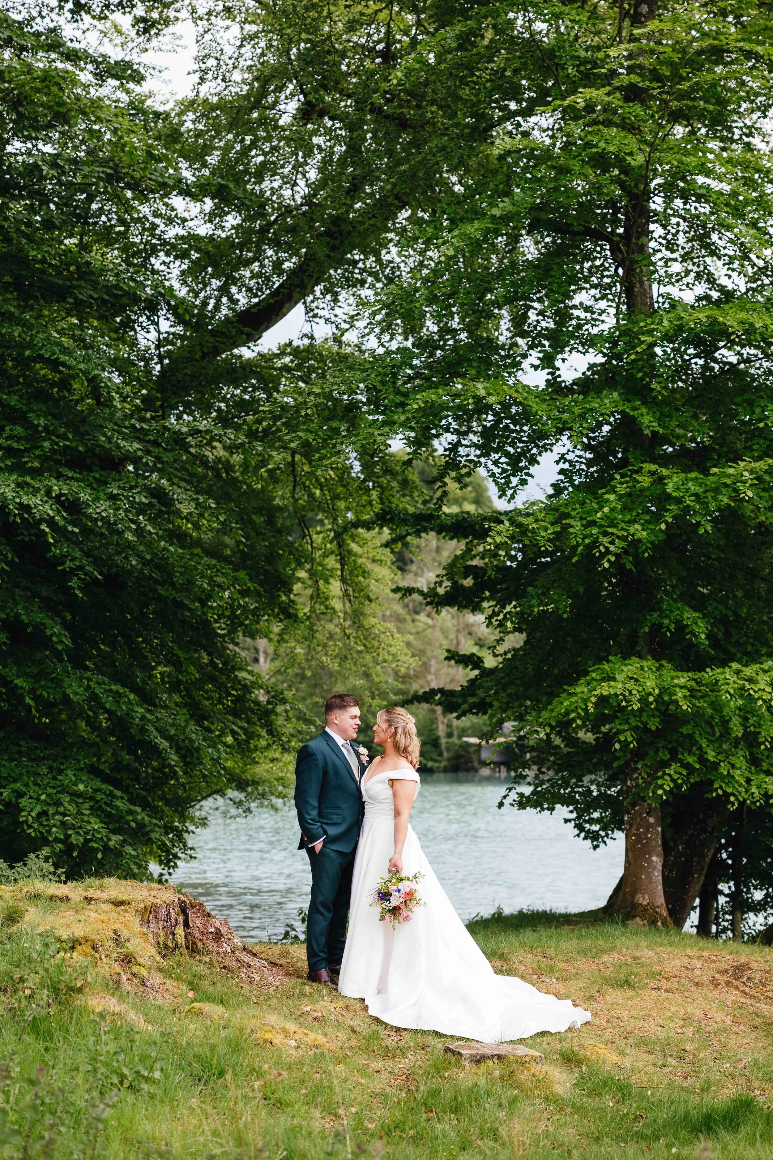 Couple by lake at Deer Park Barn Fonthill Estate