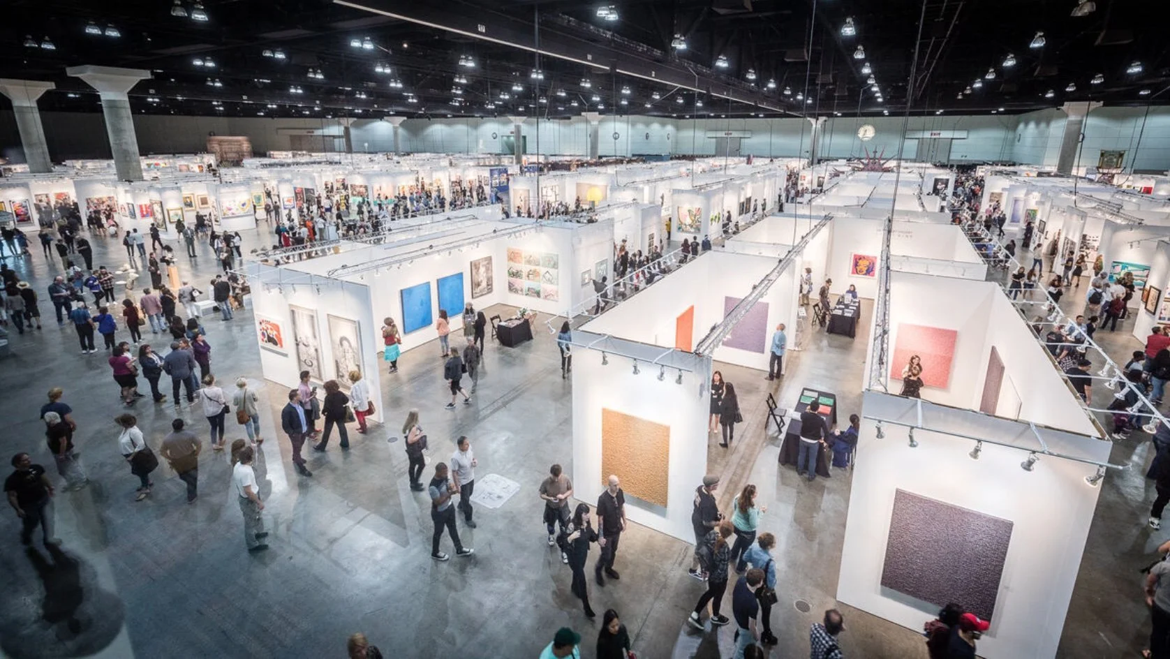 Visitors exploring a contemporary art show