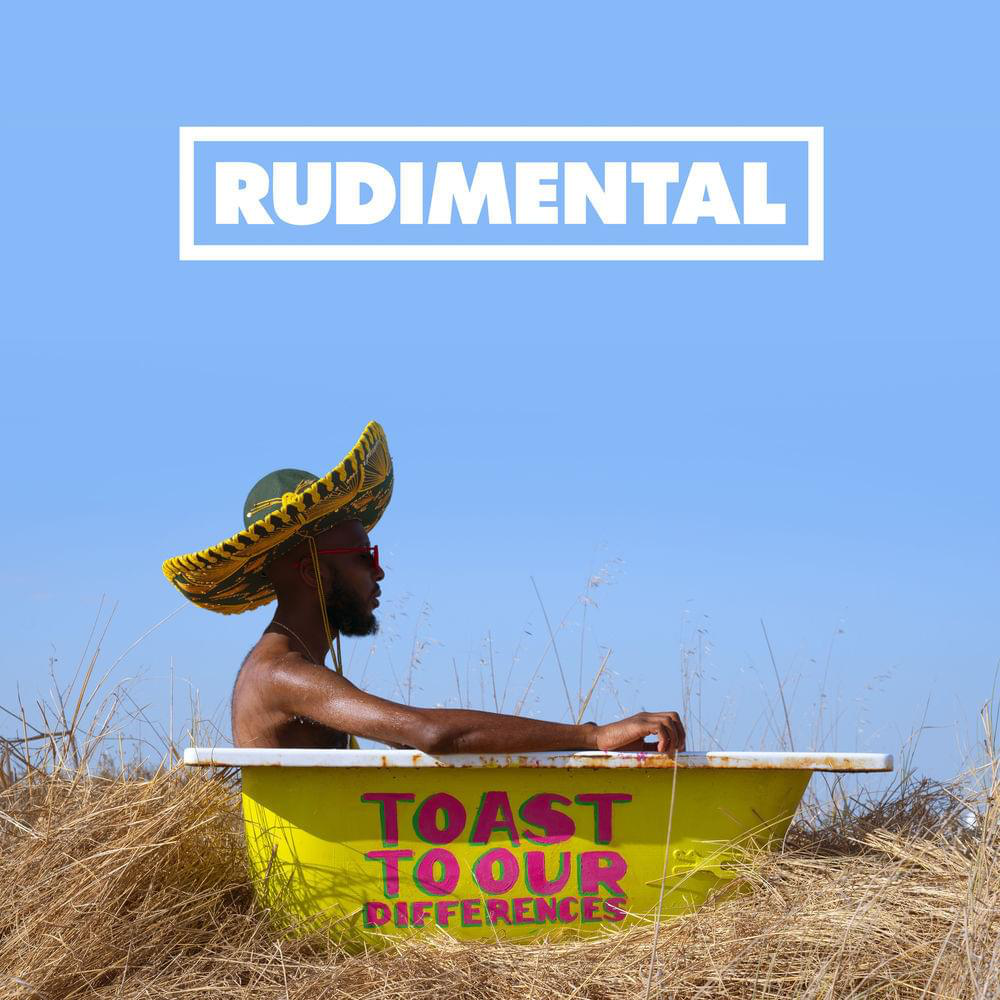 Image of  a man with a sombrero in a yellow tub with text "toast to out differences"