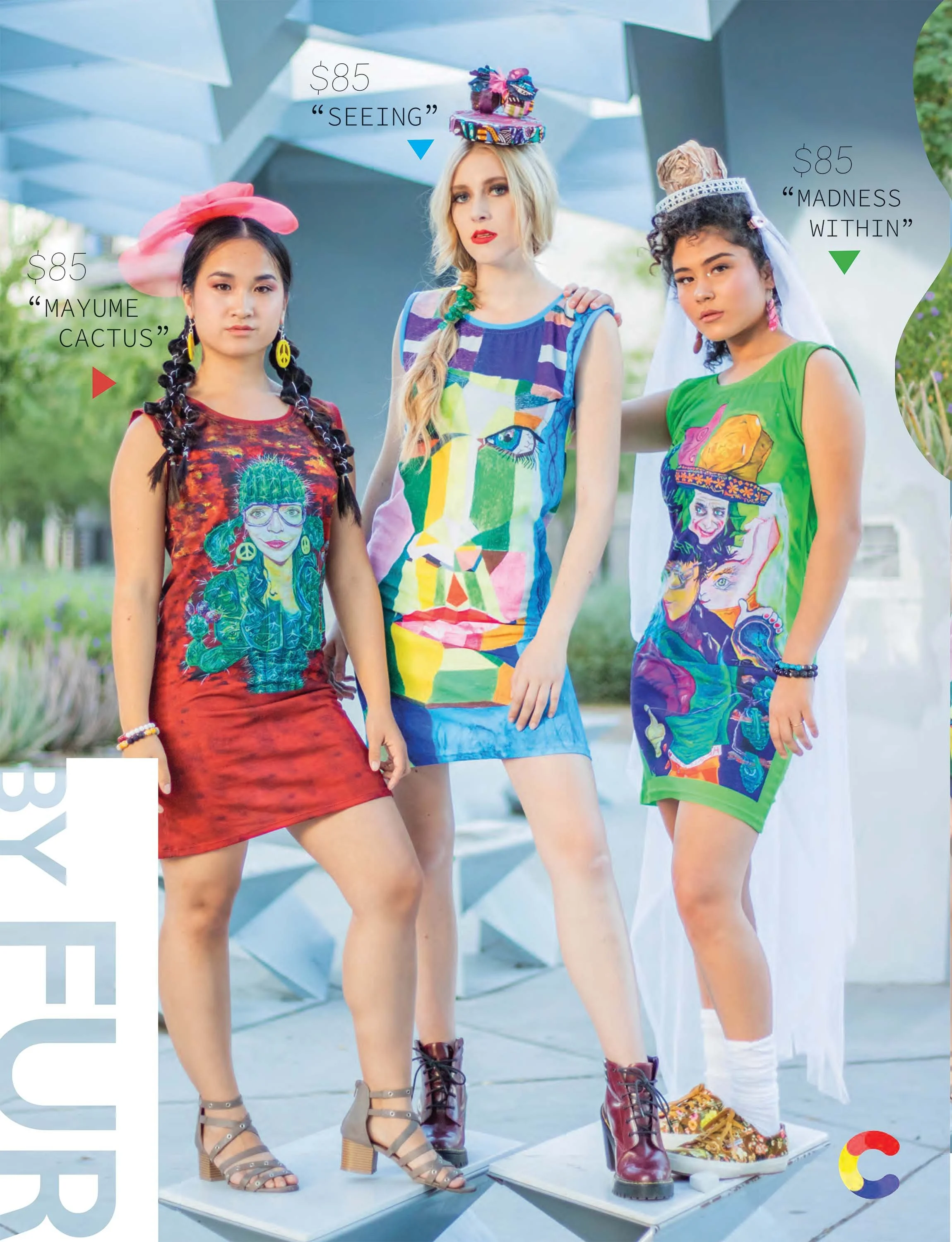 IMage of three models modeling dresses Designed by FUR