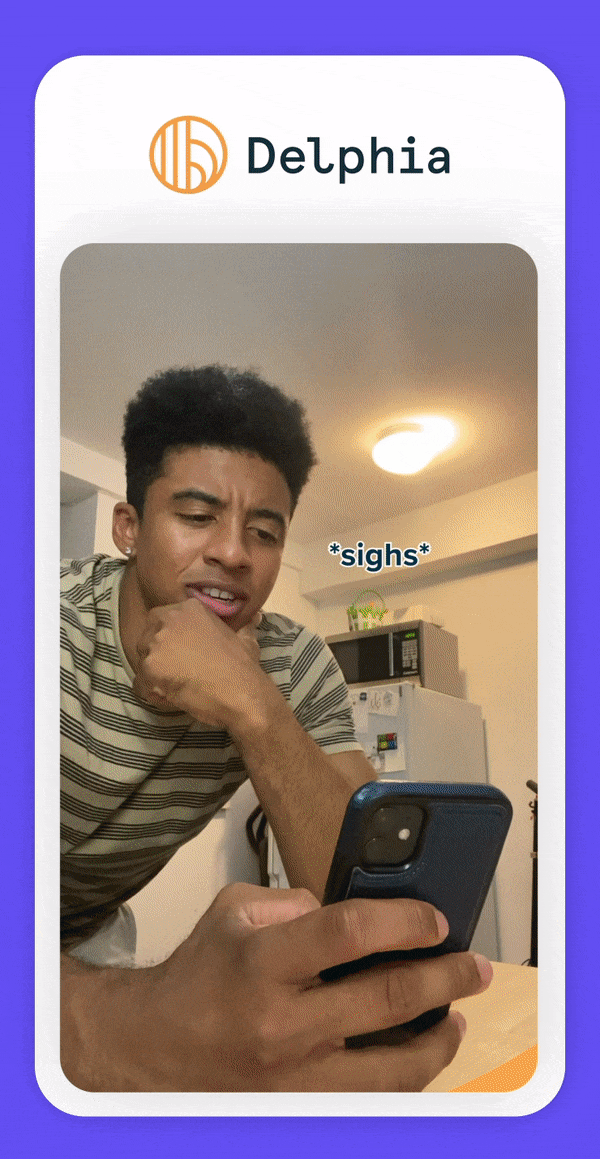 A person looking at a smartphone with a confused or concerned expression, sitting in a kitchen with a microwave and refrigerator in the background, with the word '*sighs*' on the image.