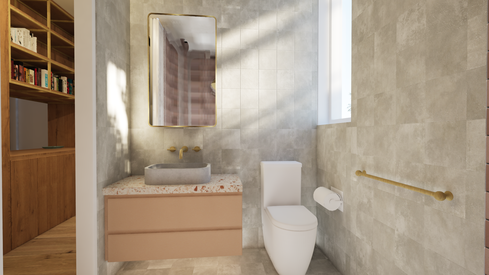 Drawers in the vanity provide excellent storage. The finishes chosen for the vanity reflect the material palette of the kitchen. A concrete basin introduces an additional textural element. Brushed brass tapware, a towel rail, and the mirror frame con