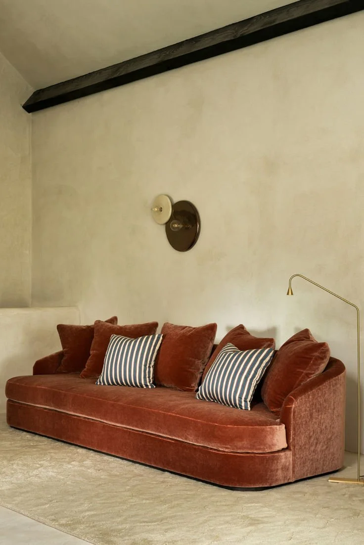 Upholstered velvet sofa