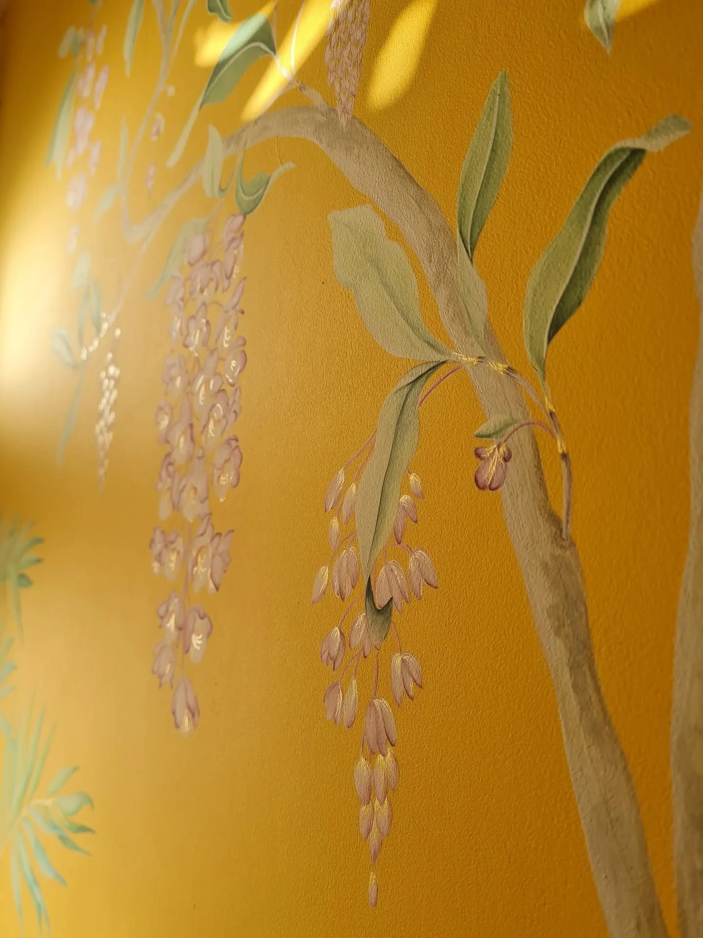 Chandeliers of golden orchid inspired flowers