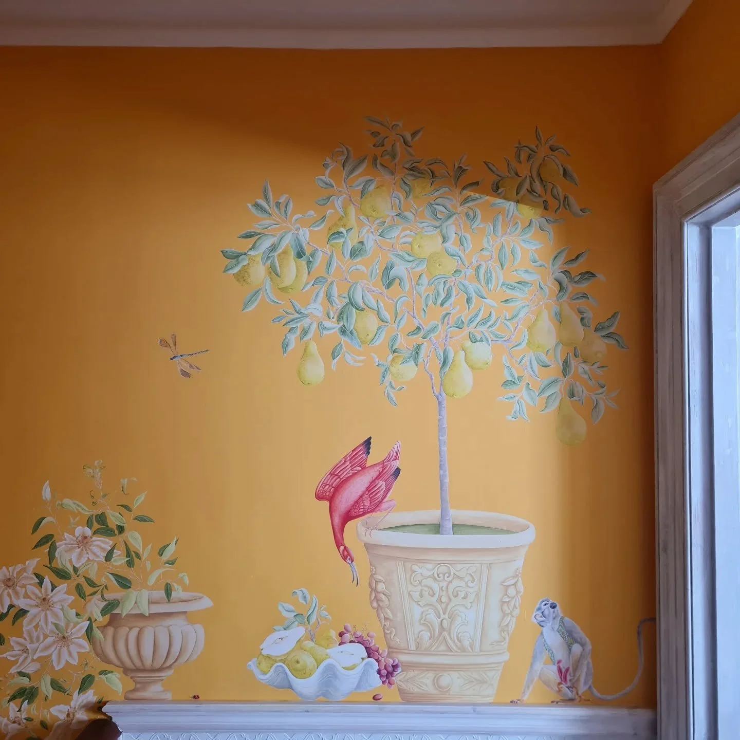 Up on the landing sits a pear tree &amp; a trailing clematis.

The afternoon sun catches this space and brings all the gold detailing to life in a rich warm glow.