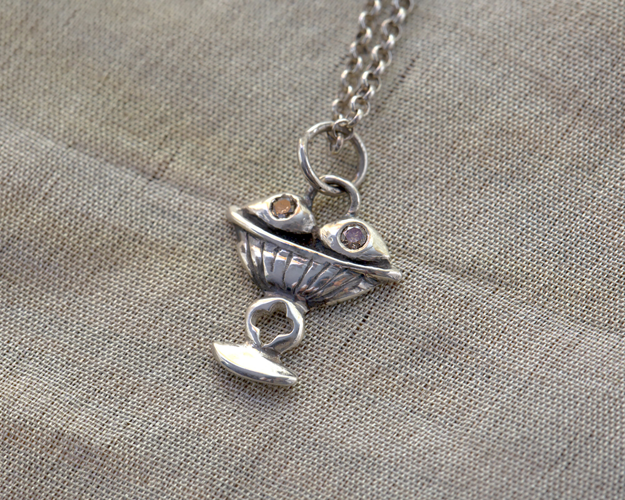 Saint Lucy Necklace
NECKLACES, SAINT LUCY, SAINT LUCIA, EMERALD, SAPPHIRE, DIAMOND, SMOKY QUARTZ, QUARTZ, SAINT JEWELRY, SAINT LUCY JEWELRY
Lucille Geist Jewelry