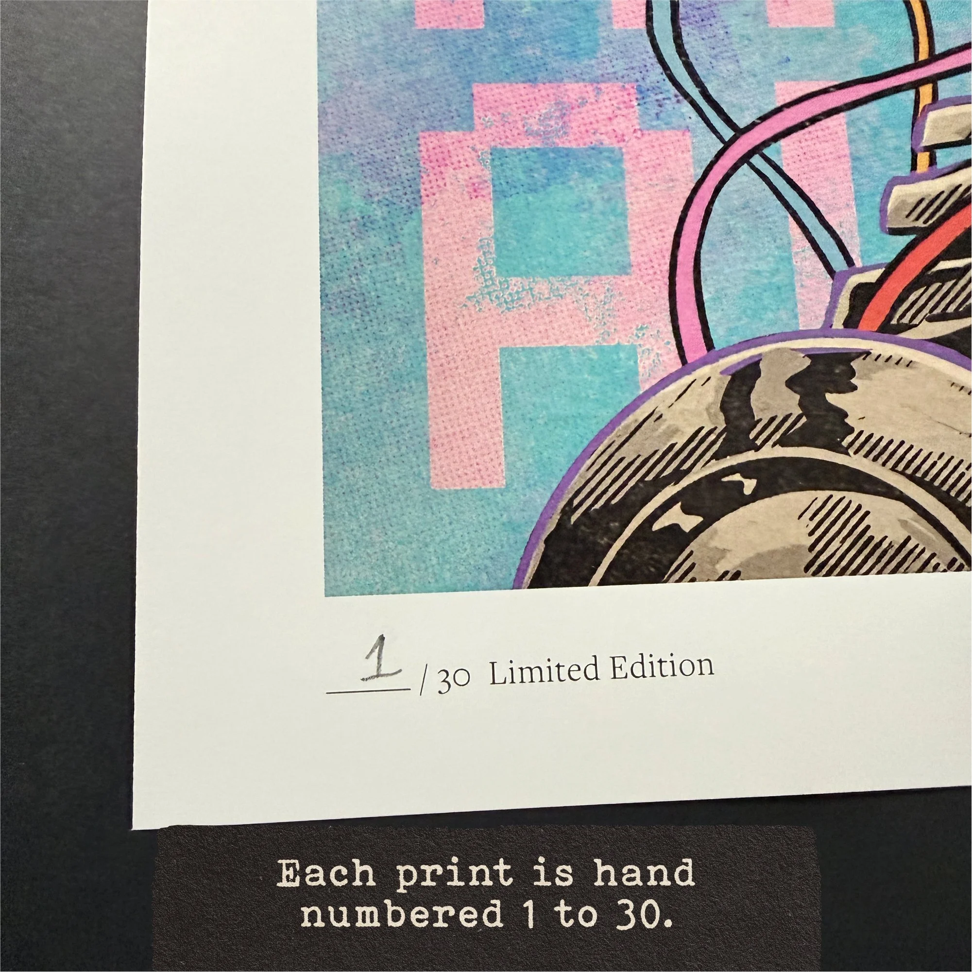 Close-up of the lower left corner of the “Awake Cyborg” print showing the hand-numbered limited-edition mark, with overlay text reading, “Each print is hand numbered 1 to 30.”