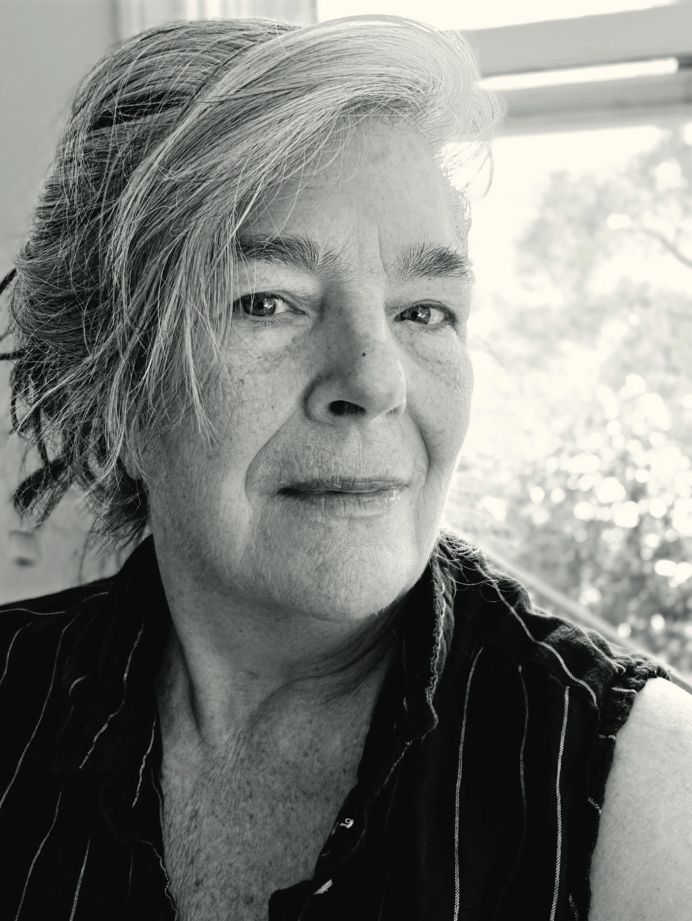 author photo hair up.jpg