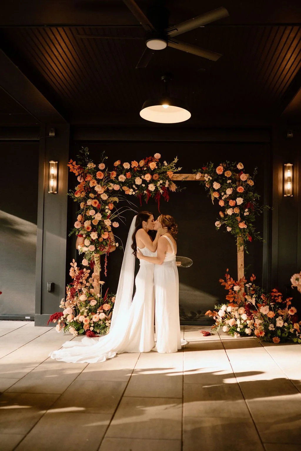 brides kissing after the ceremony