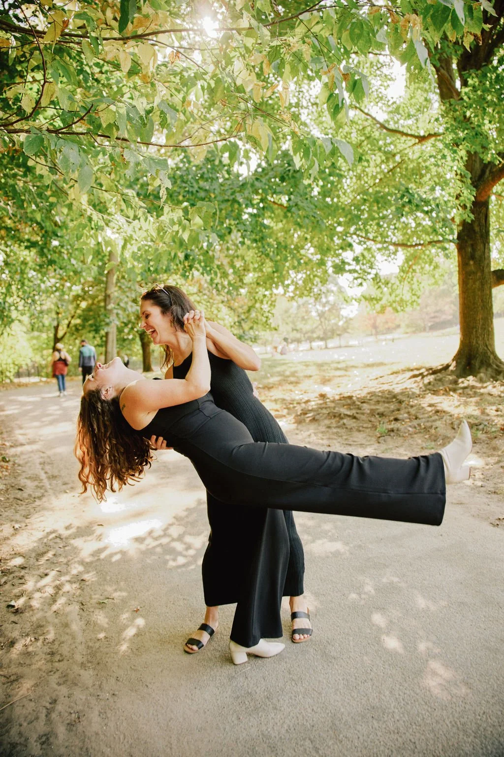 candid queer engagement photos at prospect park in brooklyn