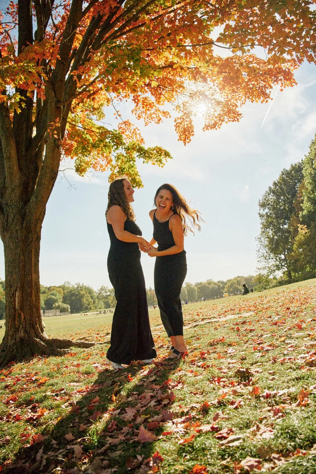 candid queer engagement photos at prospect park in brooklyn