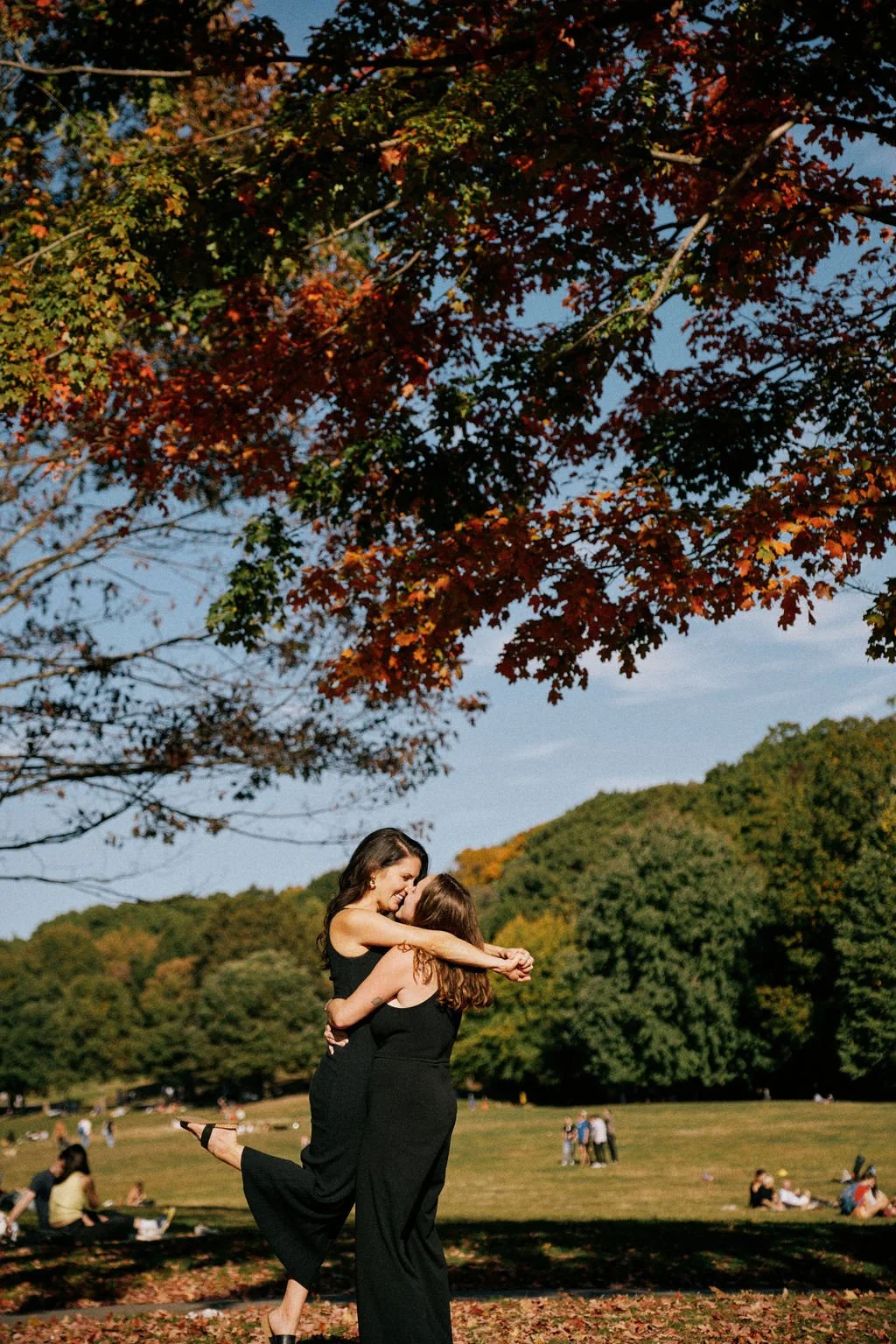 candid queer engagement photos at prospect park in brooklyn