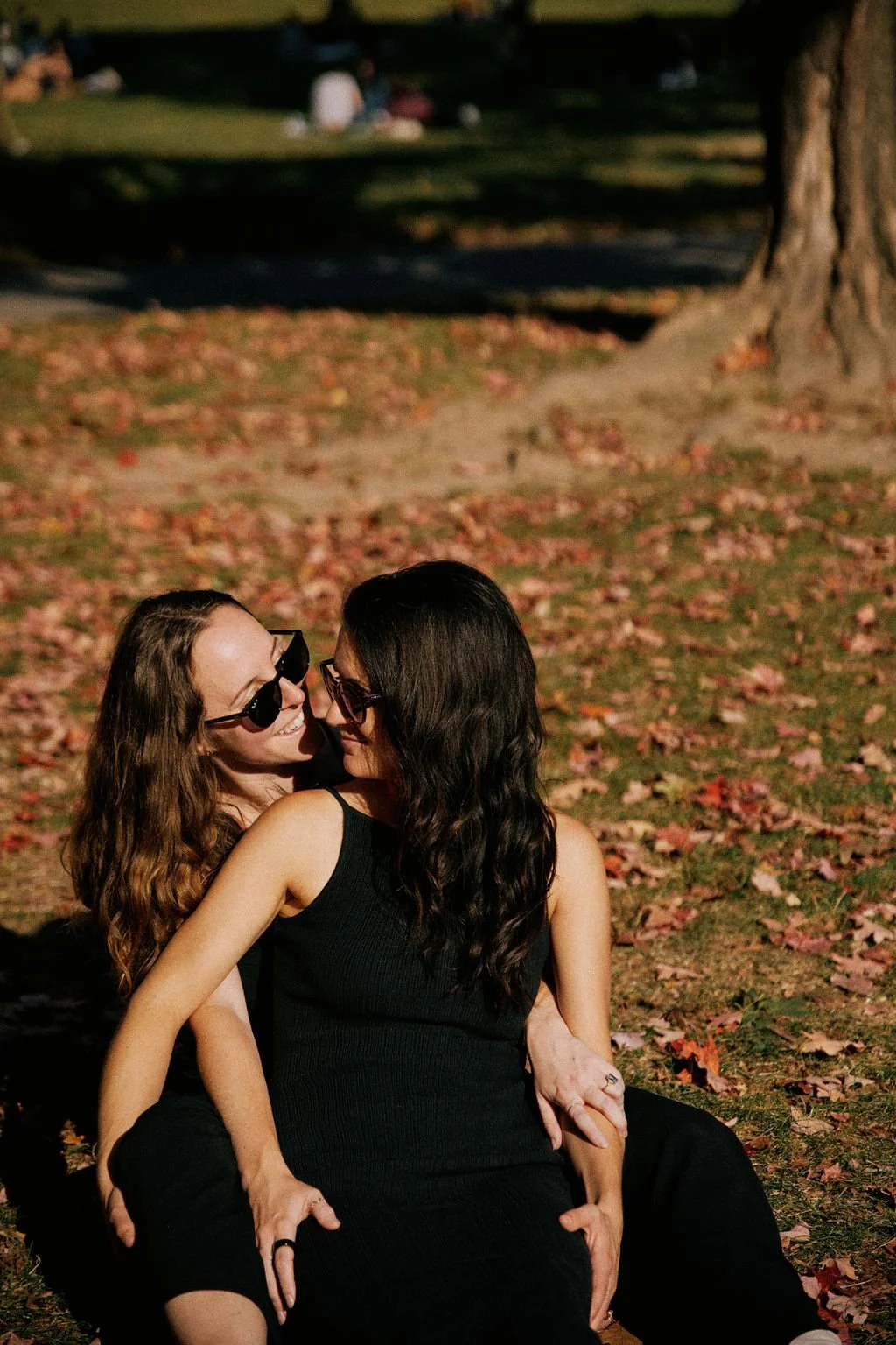 candid queer engagement photos at prospect park in brooklyn