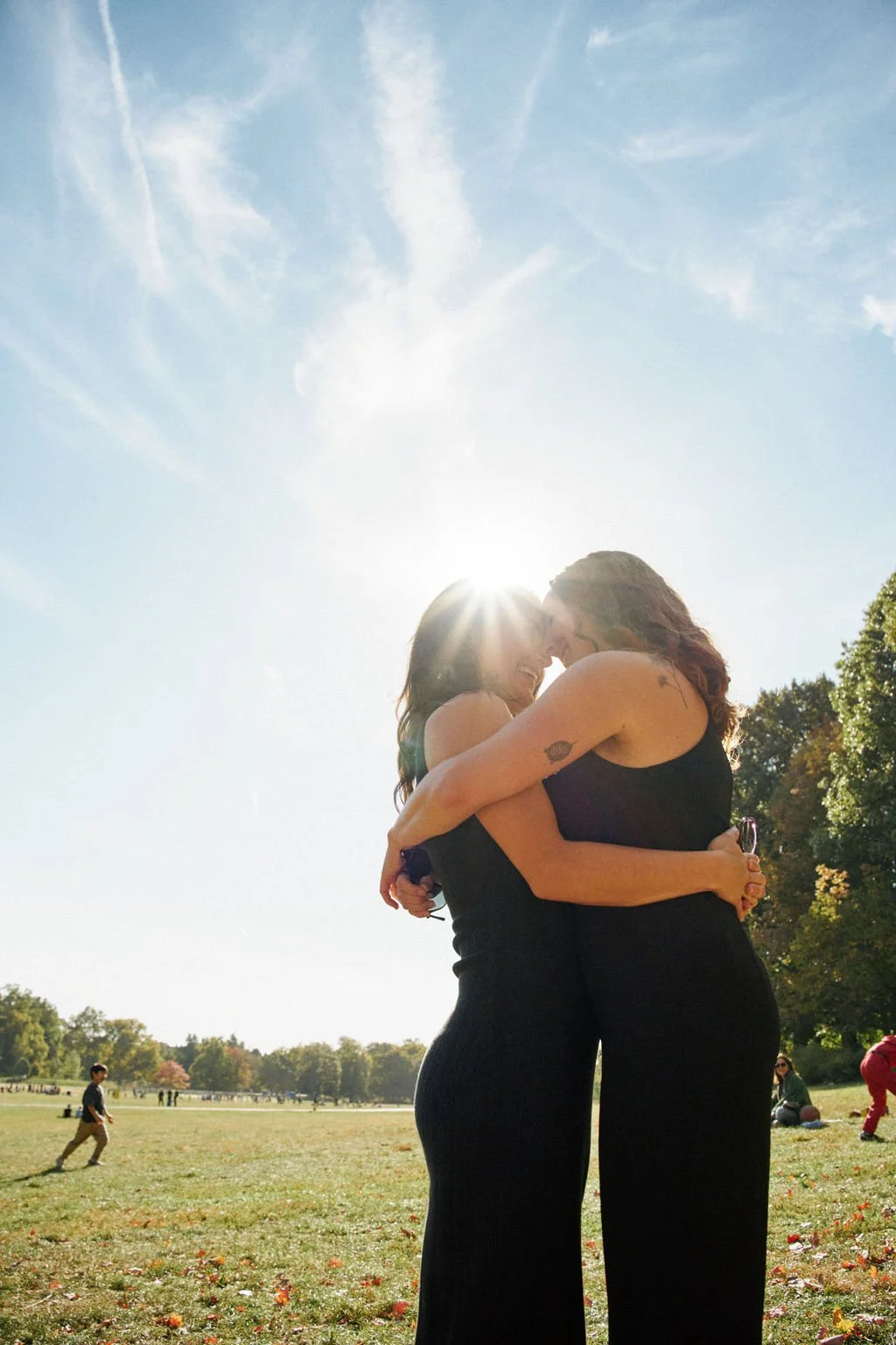 candid queer engagement photos at prospect park in brooklyn