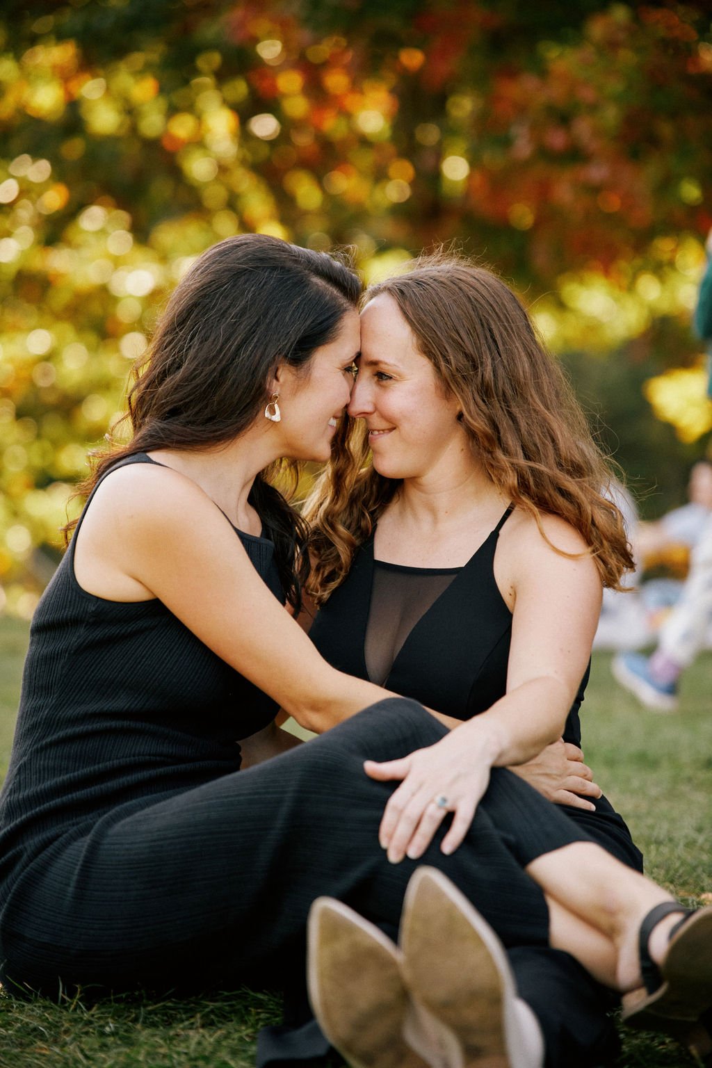 candid queer engagement photos at prospect park in brooklyn