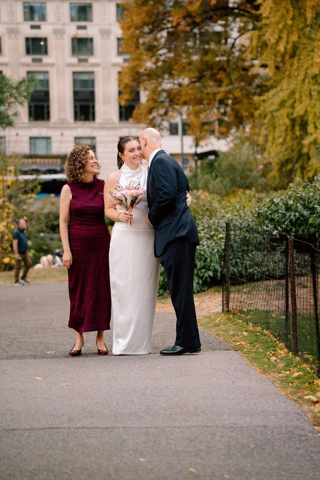 parents walking bride down the aisle for the cop cot elopement ceremony in central park