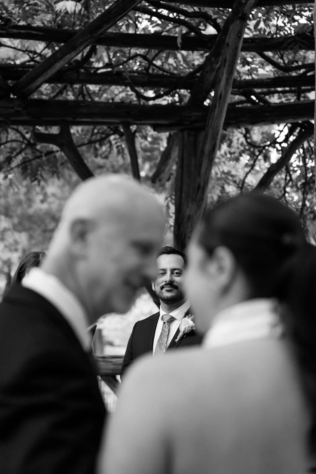 parents walking bride down the aisle for the cop cot elopement ceremony in central park