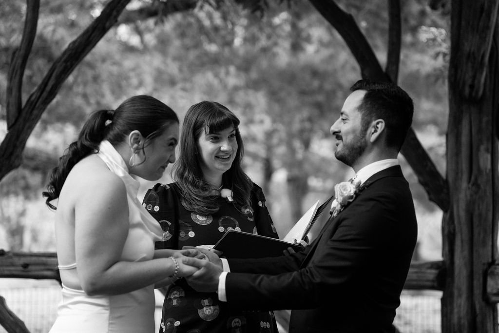 candid central park elopement ceremony at cop cot