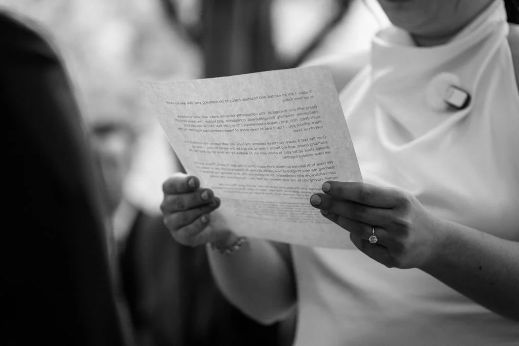 bride and groom exchanging vows during their elopement ceremony at cop cot