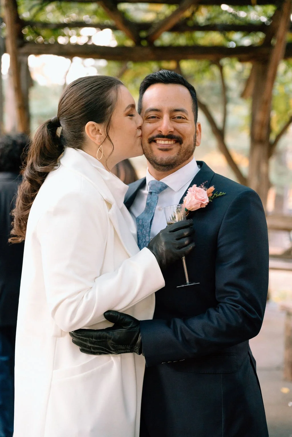 romantic elopement couple moments in central park surrounded by fall foliage
