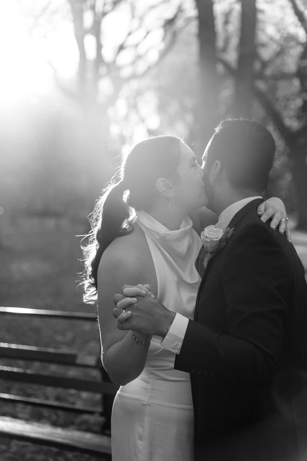 romantic elopement couple moments in central park surrounded by fall foliage