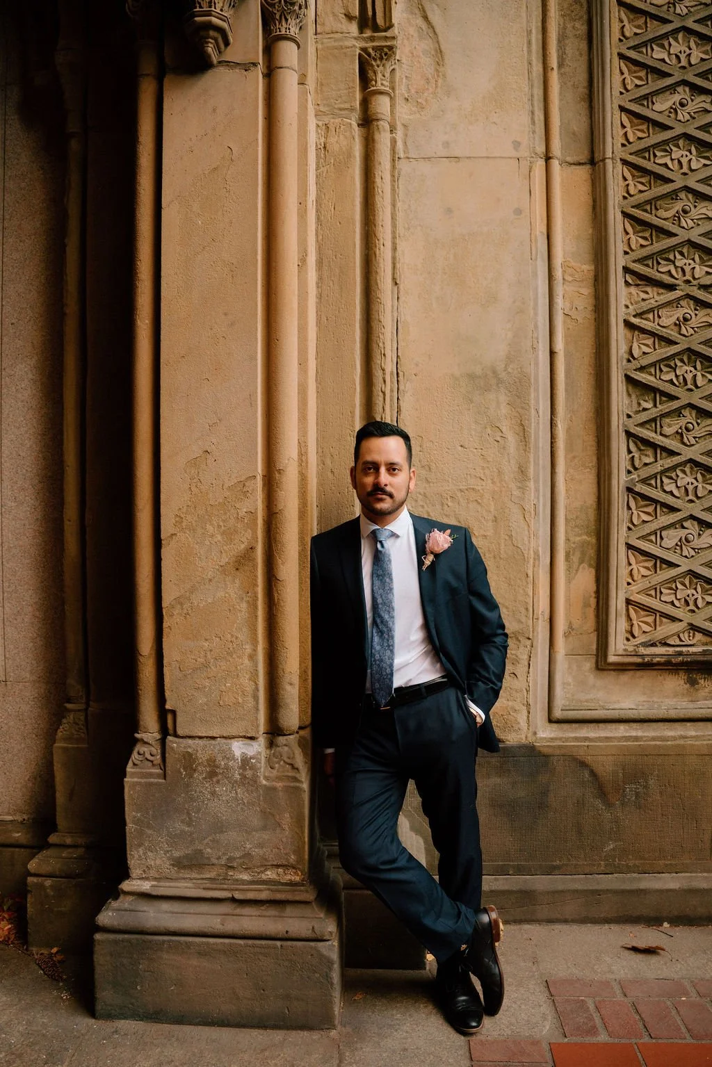 groom portrait at bethesda terrace in nyc