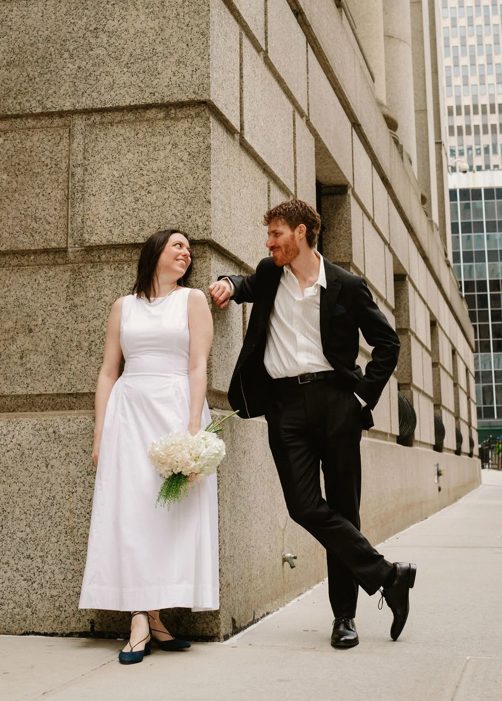 Couple celebrating their city hall wedding in downtown Manhattan