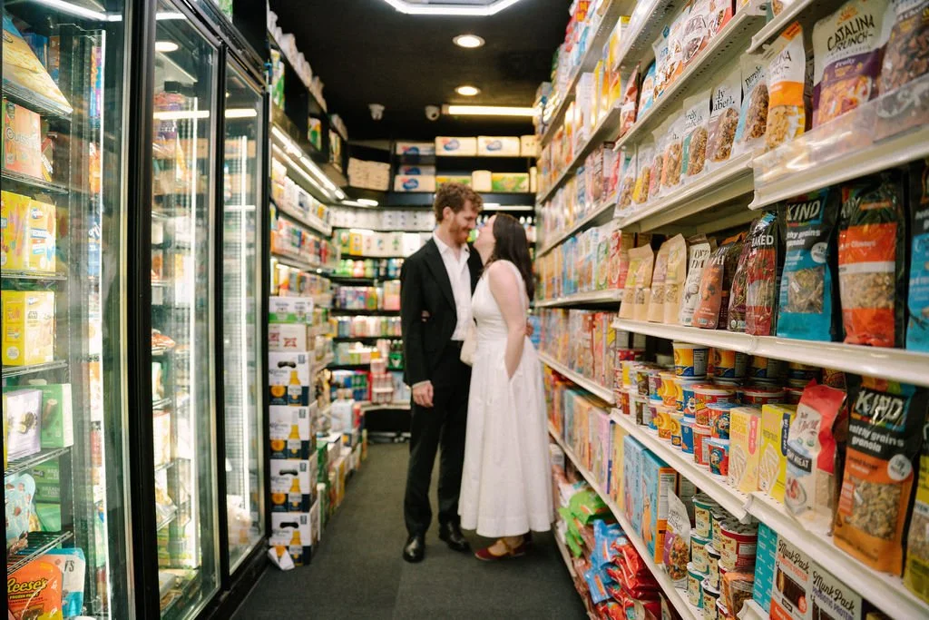 newlyweds in their favorite NYC bodega