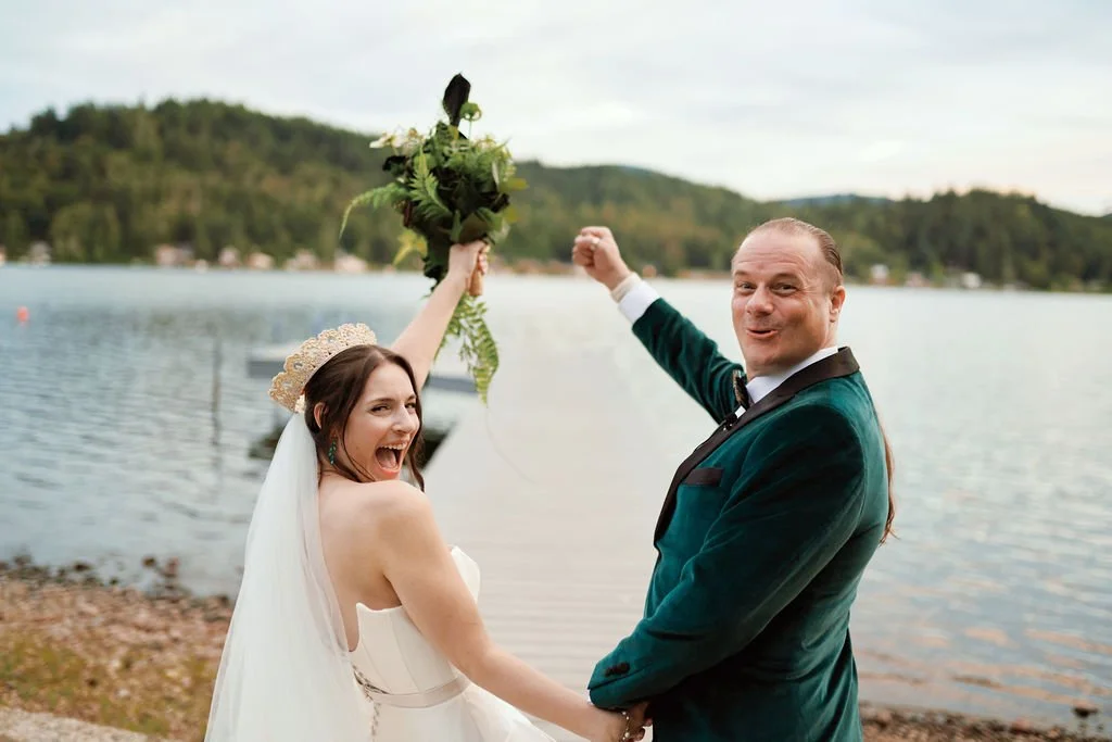 sweet wedding couple on the dock of the castle at summit lake