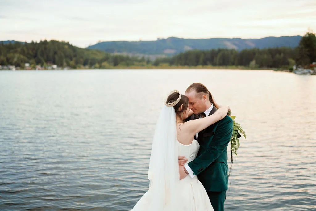 sweet wedding couple on the dock of the castle at summit lake