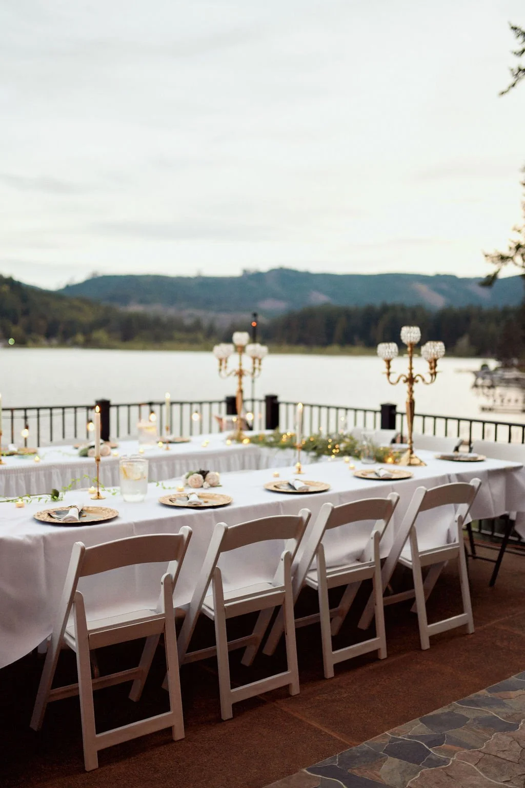 The Castle at Summit Lake outdoor wedding reception set up overlooking the lake